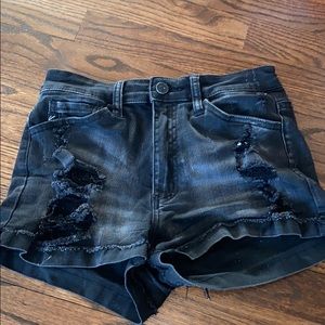 Black ripped shorts